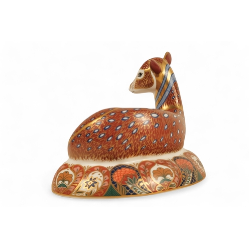 241 - A Royal Crown Derby deer paperweight - in a recumbent pose, 13cm high.