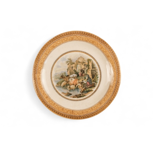 247 - A Prattware part dessert service - comprising a comport and four plates, 23cm diameter.