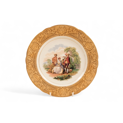 247 - A Prattware part dessert service - comprising a comport and four plates, 23cm diameter.