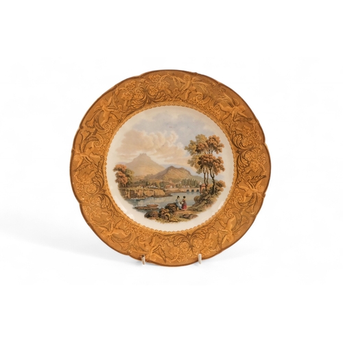 247 - A Prattware part dessert service - comprising a comport and four plates, 23cm diameter.