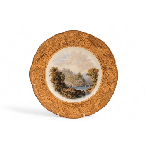 247 - A Prattware part dessert service - comprising a comport and four plates, 23cm diameter.