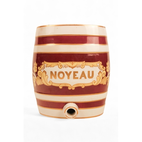 252 - An early 20th century spirit barrel - of oval form, white and red banded and marked Noyeau within a ... 