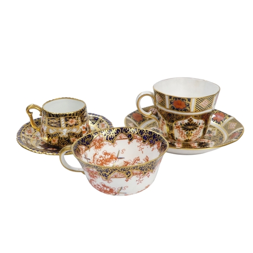 254 - A Royal Crown Derby teacup and saucer - decorated with the Imari style, together with another simila... 