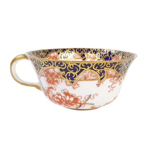 254 - A Royal Crown Derby teacup and saucer - decorated with the Imari style, together with another simila... 