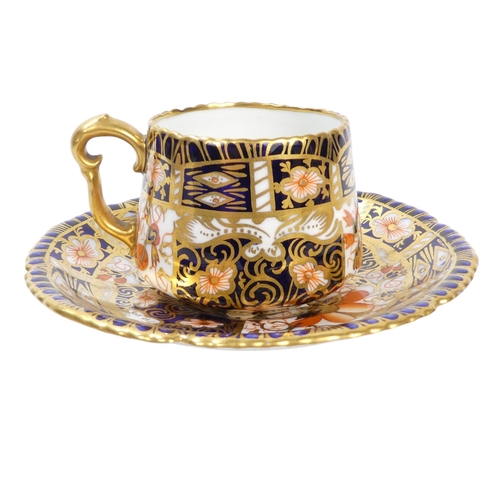 254 - A Royal Crown Derby teacup and saucer - decorated with the Imari style, together with another simila... 