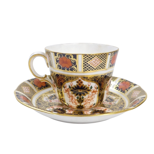 254 - A Royal Crown Derby teacup and saucer - decorated with the Imari style, together with another simila... 