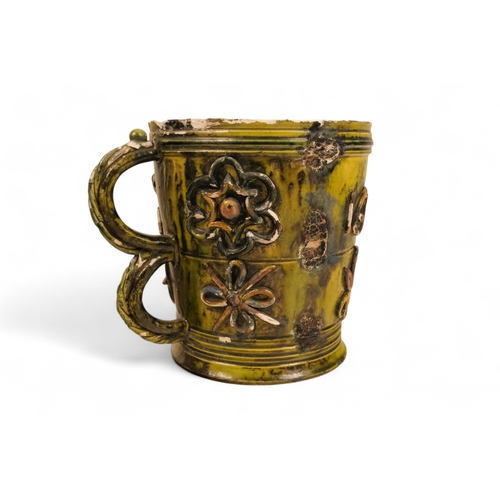 266 - A Castle Hedingham green glazed mug - bearing the date 1612, castle mark and inscribed to base, 17cm... 