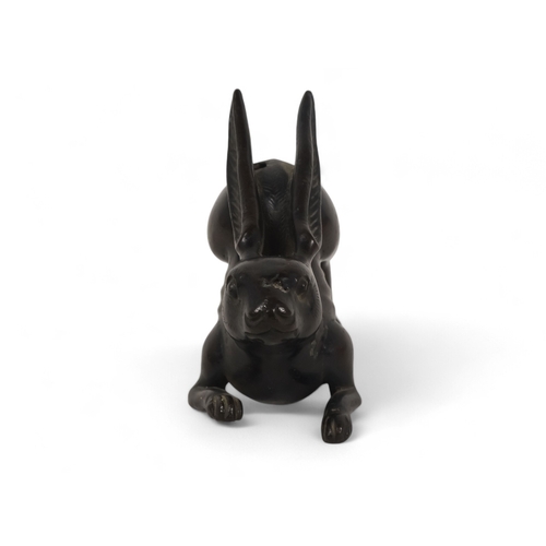 329 - A Japanese bronze rabbit - Meiji period (1865-1912) modelled in a squatting position with engraved f... 