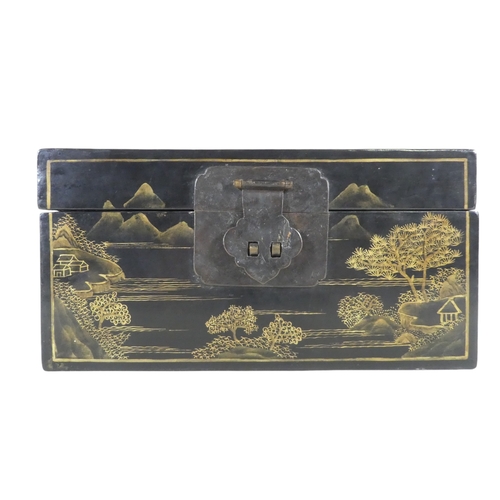 335 - A 20th century black lacquer chinoiserie box - of rectangular form and decorated with landscape scen... 