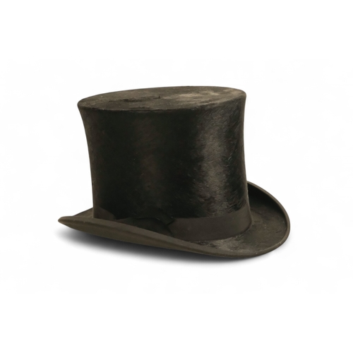 402 - A black silk top hat.