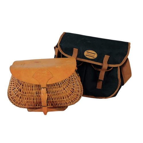 43 - A contemporary wicker fishing creel - with a tan leather cover and canvas pouch, 36cm wide, together... 