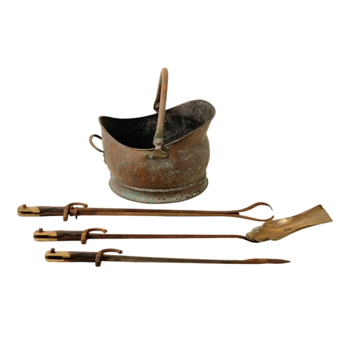 434 - A set of three 19th century fire tools - modelled from French bayonets, including a poker, a pair of... 