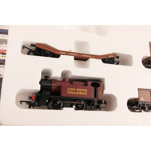 480 - A Hornby Flying Scotsman train and track set-up - boxed, together with a similar 'Industrial' track ... 