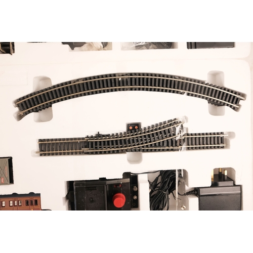 480 - A Hornby Flying Scotsman train and track set-up - boxed, together with a similar 'Industrial' track ... 