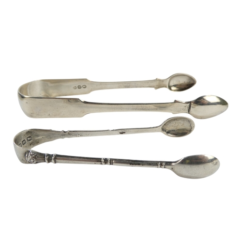 492 - A pair of Georgian silver sugar nips - together with another pair, 56g.