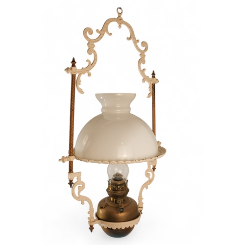 54 - A late 19th century hall lantern - square with stained glass panels and fitted with an oil lamp, 37c... 