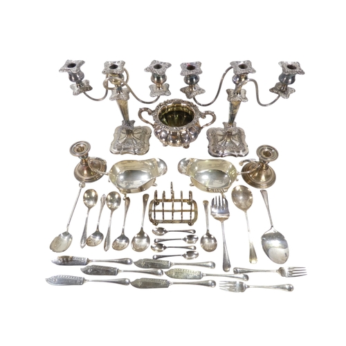 557 - A quantity of 20th century plated wares - including a pair of three branch candlesticks, two large s... 