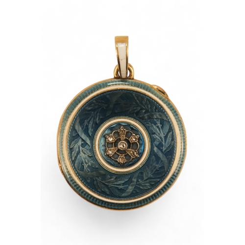 572 - An early 20th century guilloche and yellow metal locket pendant - in blue and white, set with a diam... 