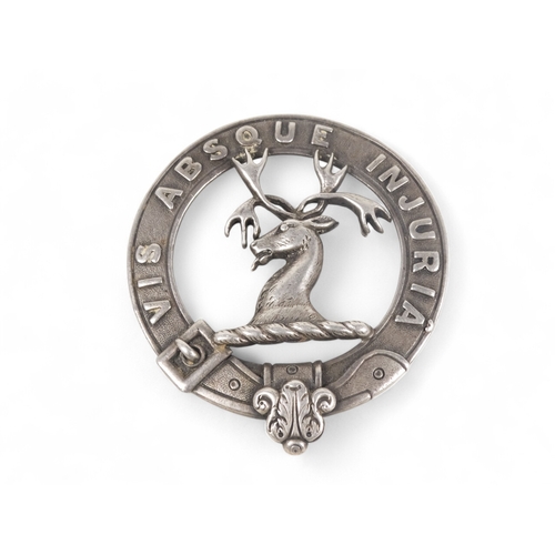 573 - A silver plaid brooch - London 1874, modelled with a stags head within belt with latin inscription '... 