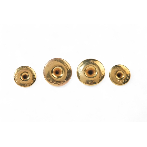 591 - A set of four 9ct gold shirt studs - in smart leather silk lined retail box for D.S. Morgan of Neath... 