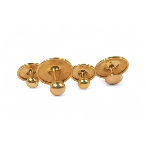 591 - A set of four 9ct gold shirt studs - in smart leather silk lined retail box for D.S. Morgan of Neath... 