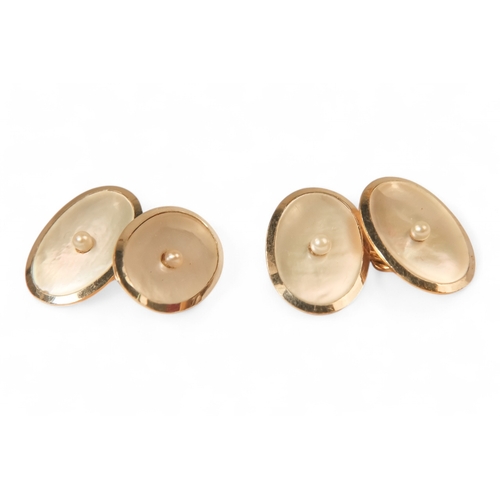 592 - A boxed set of 18ct gold shirt studs and cufflinks - mother-of-pearl and pearl set, 15.6g.