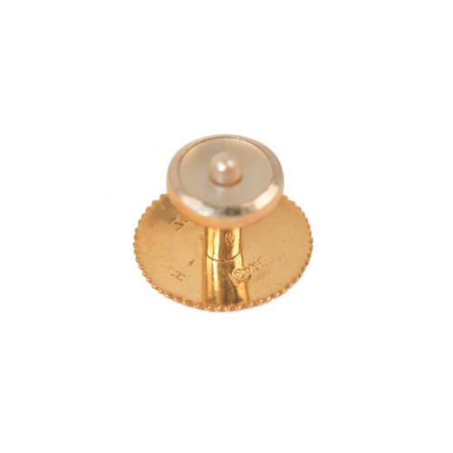 592 - A boxed set of 18ct gold shirt studs and cufflinks - mother-of-pearl and pearl set, 15.6g.