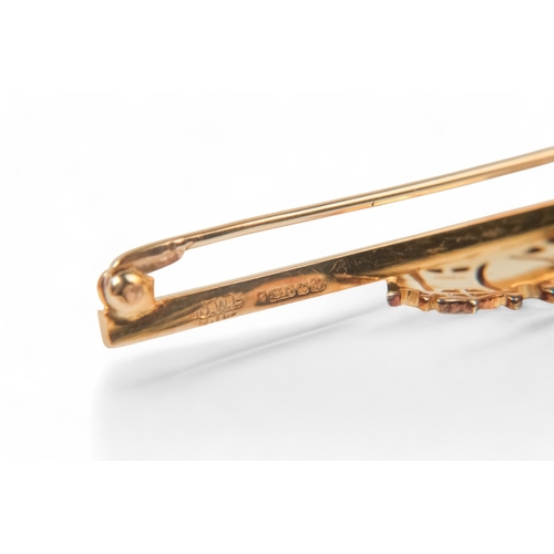 598 - A 9ct gold crown bar brooch - set with pearls, 4g.