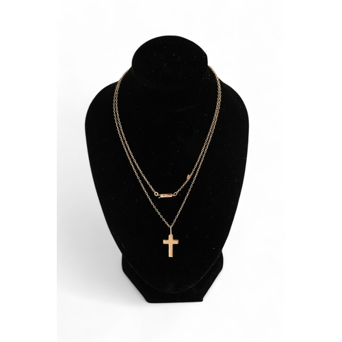 628 - A 14ct gold cross on a 15ct gold fine link chain - together with a 9ct pendant, a short length of ch... 