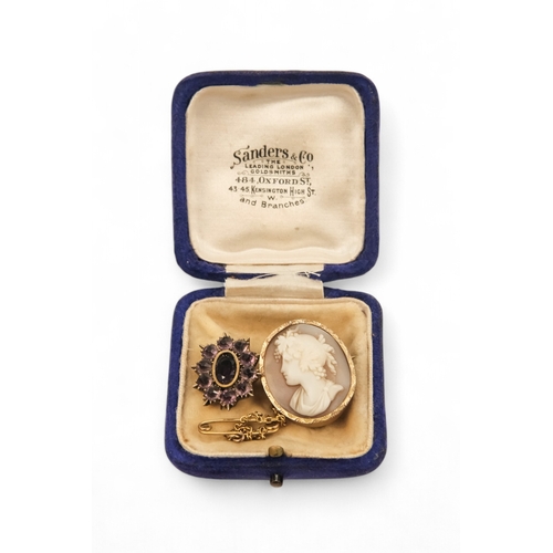 632 - An early 20th century cameo brooch - oval carved with the head of a young woman, set in a gilt frame... 