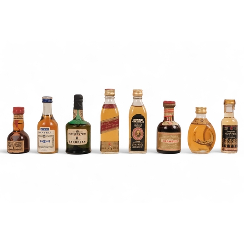 70 - A quantity of miniatures - including whisky, brandy and fortified wines.