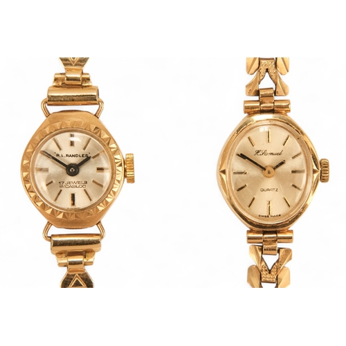 704 - A ladies 9ct gold cocktail watch - oval with a cream dial set out in baton numerals, 10.2g all in, t... 