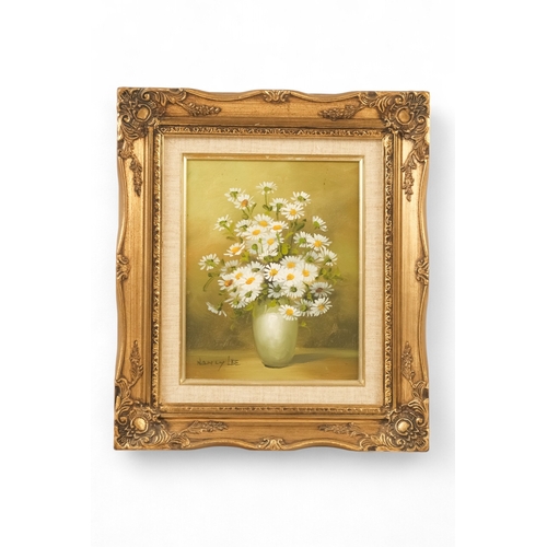 775 - Nancy Lee WILLCOX (XX) Still Life Daisies Oil on board Signed lower left Framed  Picture size 24 x 1... 