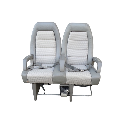 901 - A Siamese pair of aircraft seats from Concorde - in grey Connolly leather and cloth, with tilting ba... 