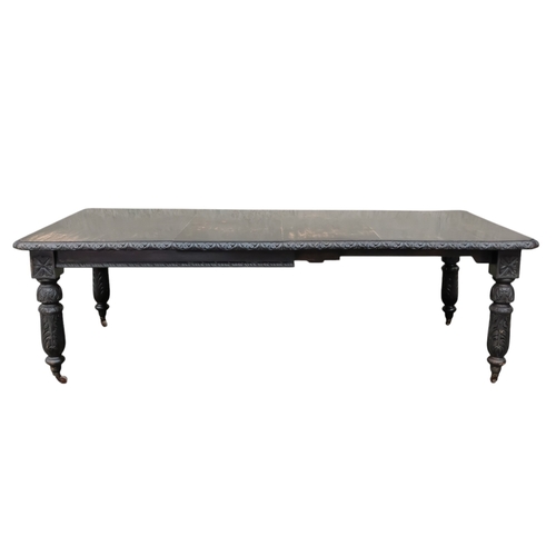 905 - A 17th century style oak extending dining table - with two leaf insertions, the rectangular top with... 