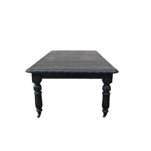 905 - A 17th century style oak extending dining table - with two leaf insertions, the rectangular top with... 