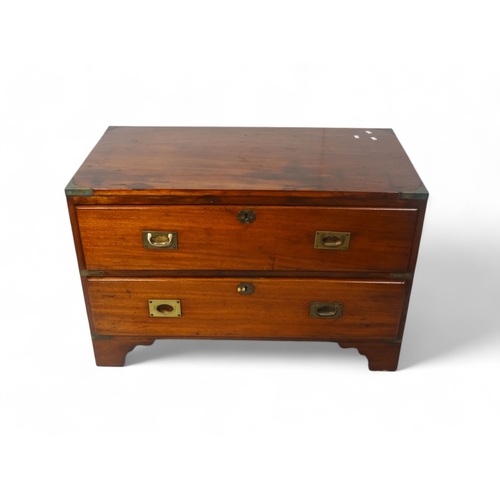 920 - A late Victorian camphorwood chest - rectangular with brass angle brackets and two graduated drawers... 