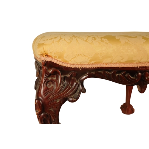 930 - A George II style mahogany stool - with a rectangular gold damask upholstered seat above leaf carved... 