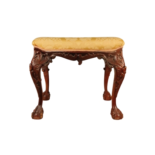 930 - A George II style mahogany stool - with a rectangular gold damask upholstered seat above leaf carved... 