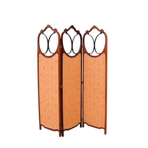 938 - An Edwardian mahogany three fold screen - the upper section with bevelled glazed panels and damask u... 