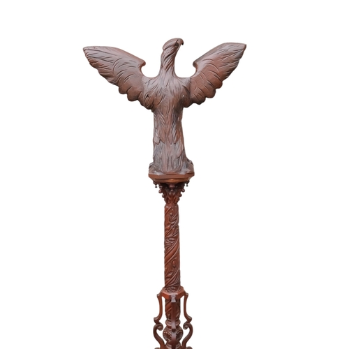 943 - A 20th century carved hardwood lectern - modelled as an eagle with wings outstretched, the support c... 