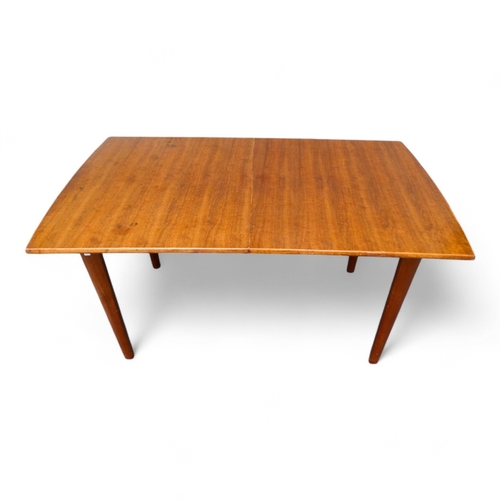 947 - A Gordon Russell, Broadway walnut extending dining table - the rectangular top on rectangular taperi... 