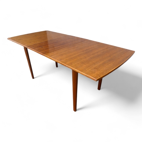 947 - A Gordon Russell, Broadway walnut extending dining table - the rectangular top on rectangular taperi... 