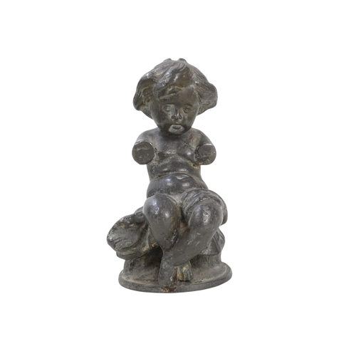 100 - A late 19th century spelter figure of a young boy - holding a bird, 37cm high, together with a small... 