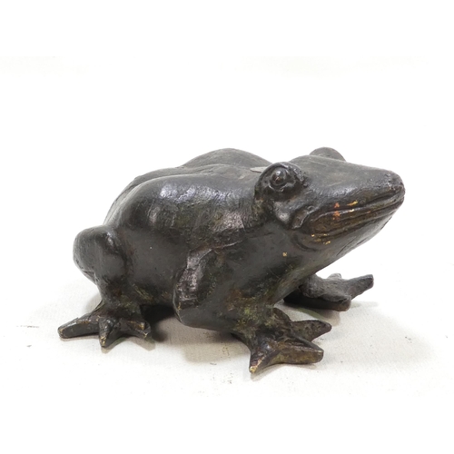 101 - A pair of late 19th century cast bronze frogs - with brown patination, 9cm wide. (2)