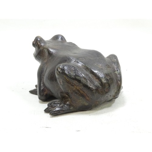 101 - A pair of late 19th century cast bronze frogs - with brown patination, 9cm wide. (2)