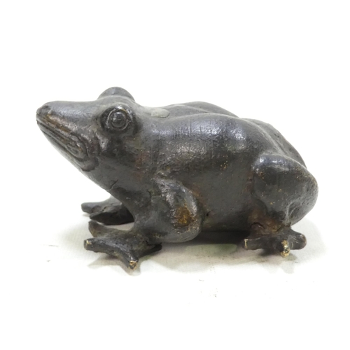 101 - A pair of late 19th century cast bronze frogs - with brown patination, 9cm wide. (2)