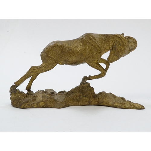 102 - A cast bronze figure of a mountain goat - after P J Mene, mounted on a naturalistic base, 8cm high, ... 