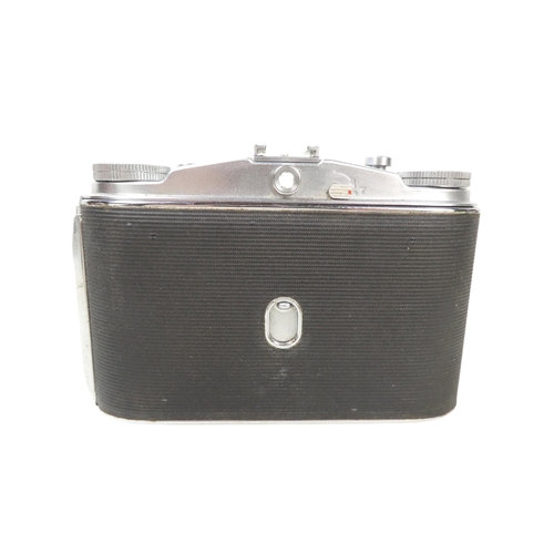 106 - An Agfa 35mm camera - in a brown leather case, together with another earlier example. (2)