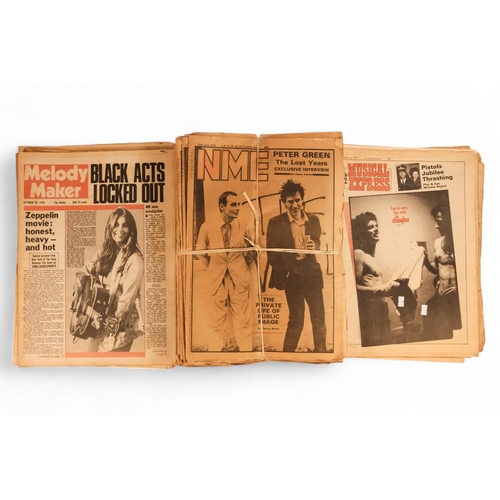 107 - A quantity of back copies of music media - Melody Maker and New Musical Express, circa 1970's.